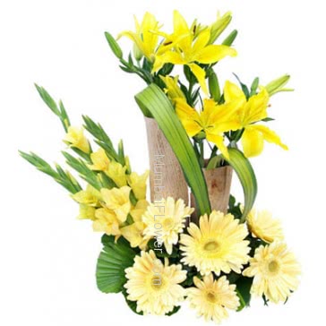 Arrangement of 5 pc Asiatic Yellow Lilies and 6 Yellow Gerberas and 10 Yellow Gladioli the sunny arrangement very fresh and very much energetic.