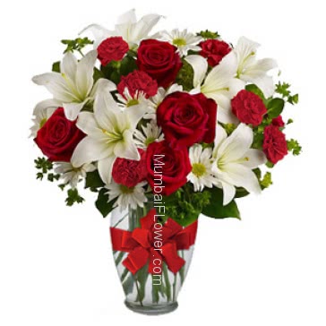 Glass vase with 5 PC Asiatic White Lilies, 10 Red Roses, 10 Red Carnation and 10 Whit Gerberas with greens
