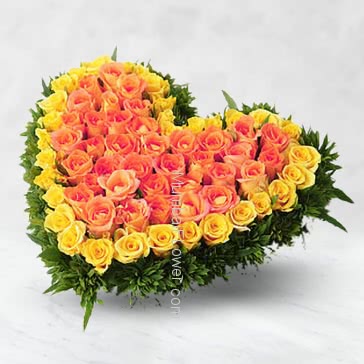 100 Yellow and Orange Roses Heart Shape Arrangement with fillers and greens