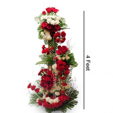 Tall Arrangement of 150 Red Roses and  Carnation with fillers and greens.<b>Please Note : </b> Photo is for Idea only actual shipment may vary in design decoration.