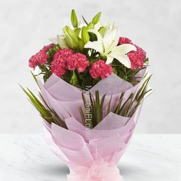 10 Red Carnation and 2 pc Asiatic White Lilies with fillers ribbons and packed with Color Paper Packing